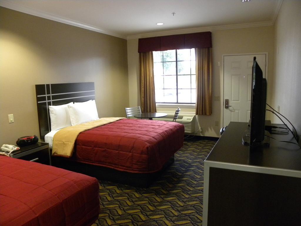 همبل Palace Inn Kingwood الغرفة الصورة